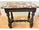 Small Louis XIII style office table in carved walnut with crimson marble top, 17th century