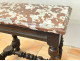 Small Louis XIII style office table in carved walnut with crimson marble top, 17th century