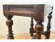 Small Louis XIII style office table in carved walnut with crimson marble top, 17th century