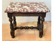 Small Louis XIII style office table in carved walnut with crimson marble top, 17th century