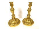 Pair of Louis XV gilt bronze candlesticks/torches with shell and foliage motifs, 18th century