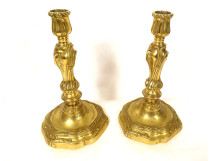 Pair of Louis XV gilt bronze candlesticks/torches with shell and foliage motifs, 18th century