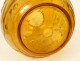 Amber-colored glass ball vase with geometric patterns in the style of Sabino, Art Deco, 20th century