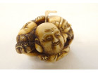 Carved ivory netsuke signed Tomochika, Noh masks, faces, Japan, Edo period, 19th century
