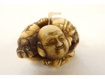 Carved ivory netsuke signed Tomochika, Noh masks, faces, Japan, Edo period, 19th century