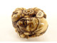 Carved ivory netsuke signed Tomochika, Noh masks, faces, Japan, Edo period, 19th century