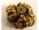 Carved ivory netsuke signed Tomochika, Noh masks, faces, Japan, Edo period, 19th century