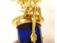 Pair of Louis XVI style candlesticks, blue crystal vases, gilt bronze, pink flowers, 18th century