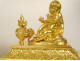 Pair of Louis XVI gilt bronze andirons with draped acanthus ram children, 18th century