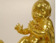 Pair of Louis XVI gilt bronze andirons with draped acanthus ram children, 18th century