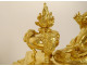 Pair of Louis XVI gilt bronze andirons with draped acanthus ram children, 18th century