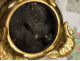 Pair of Louis XVI gilt bronze andirons with draped acanthus ram children, 18th century