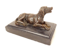Bronze sculpture paperweight depicting a reclining hunting dog, black marble, 19th century