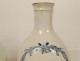 Pair of Nevers earthenware pharmacy jars and bottles, monochrome lemon balm and betony, 18th century