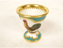 Paris porcelain egg cup decorated with a farmyard rooster, Empire gilt, 19th century