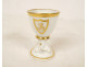 Empire porcelain egg cup, Paris, gilt decoration, busts of caryatids and sphinxes, 19th century