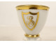 Empire porcelain egg cup, Paris, gilt decoration, busts of caryatids and sphinxes, 19th century