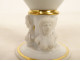 Empire porcelain egg cup, Paris, gilt decoration, busts of caryatids and sphinxes, 19th century
