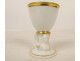 Empire porcelain egg cup, Paris, gilt decoration, busts of caryatids and sphinxes, 19th century