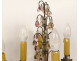 Pair of 4-light silvered bronze candelabra with fruit-colored crystal drops, 19th century