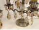 Pair of 4-light silvered bronze candelabra with fruit-colored crystal drops, 19th century