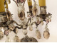 Pair of 4-light silvered bronze candelabra with fruit-colored crystal drops, 19th century