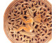Small round corozo box carved with cherub musician, torch, and quiver, 19th century