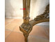 Louis XVI half-moon console table in gilt wood with coat of arms, heraldic shield, flowers, and marble, 19th century