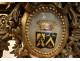 Louis XVI half-moon console table in gilt wood with coat of arms, heraldic shield, flowers, and marble, 19th century