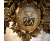 Louis XVI half-moon console table in gilt wood with coat of arms, heraldic shield, flowers, and marble, 19th century