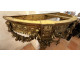 Louis XVI half-moon console table in gilt wood with coat of arms, heraldic shield, flowers, and marble, 19th century