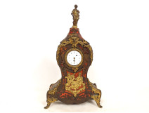 Boulle marquetry cartel clock in bronze depicting the god Mars, Cupid, and Venus, 18th century
