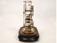 Skeleton clock and alarm unit fractions, under glass, in gilt brass nineteenth