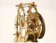 Skeleton clock and alarm unit fractions, under glass, in gilt brass nineteenth