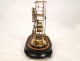 Skeleton clock and alarm unit fractions, under glass, in gilt brass nineteenth