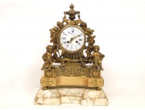 Clock in gilded bronze and marble, decorated with cherubs, Napoleon III nineteenth