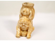 Netsuke carved ivory figure with wicker basket and Asian frog, Japan, nineteenth