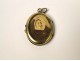 Reliquary, gilded medallion dedicated to Saint Louis de Montfort, ossibus, nineteenth