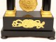 Columns blackened wood clock gilded bronze swans First Empire XIX crowns