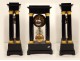 Columns blackened wood clock gilded bronze swans First Empire XIX crowns