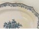 Earthenware dish northern France decor Bérain eighteenth bouquet flowers