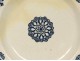 Round earthenware dish Rouen Nord France rose flowers Bérain eighteenth