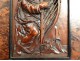 Bas-relief carved panel King David harp Israel magnifying glass adorns walnut XVII