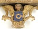 Bolster gilt polychrome carved cherub sculpture medium shield 17th