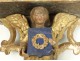 Bolster gilt polychrome carved cherub sculpture medium shield 17th