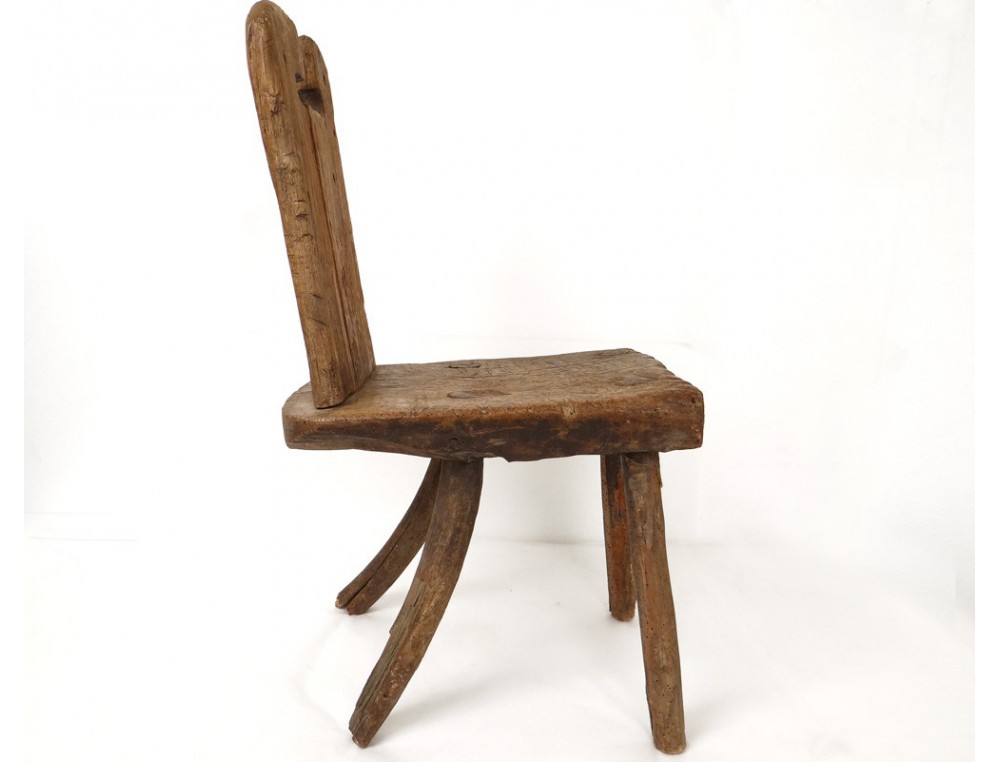 Ancien petit tabouret circulaire en bois dur sculpté de quatre pieds en