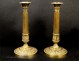 Pair of gilt bronze candlesticks first Empire nineteenth