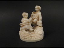 Ivory carving of Dieppe, and cat characters, 19th