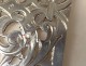 Covered fish gothic silver punch neck brace monogram late nineteenth