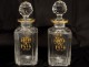 crystal liquor decanters pair carved gilt monogram nineteenth century Baccarat